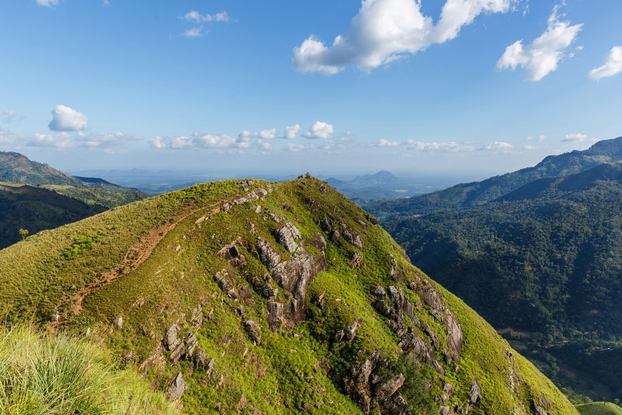 ELLA, SRI LANKA - JAN 17, 2017: scenic view of mountains and cloudy blue sky, Asia